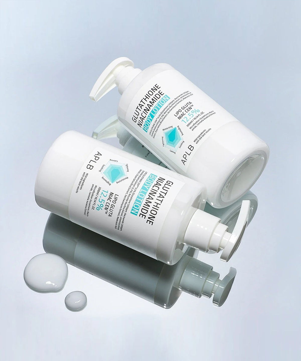 Two skincare bottles with pump dispensers on a light blue background