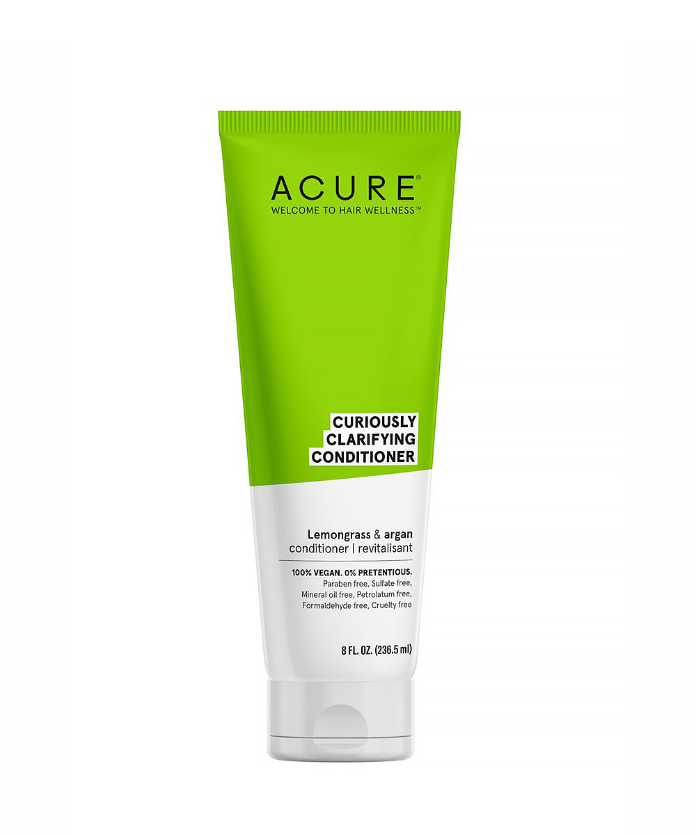 Acure Curiously Clarifying Conditioner tube on a white background