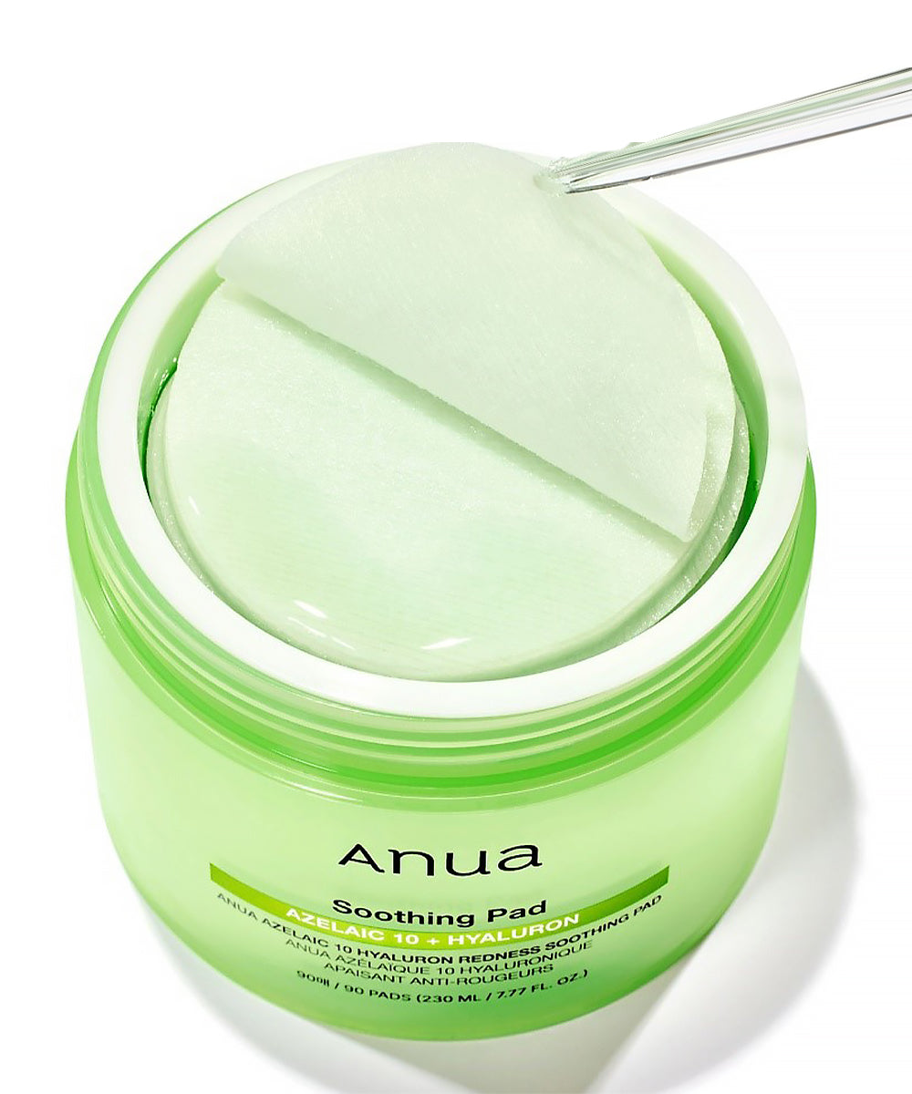 Three green skincare bottles with droppers on a white background