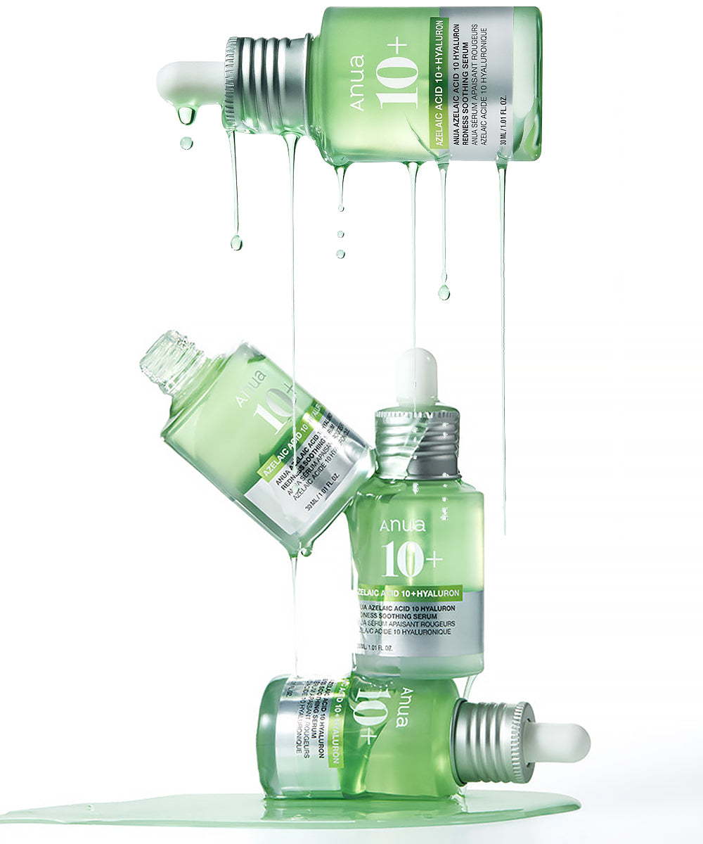 Three green skincare bottles with droppers on a white background