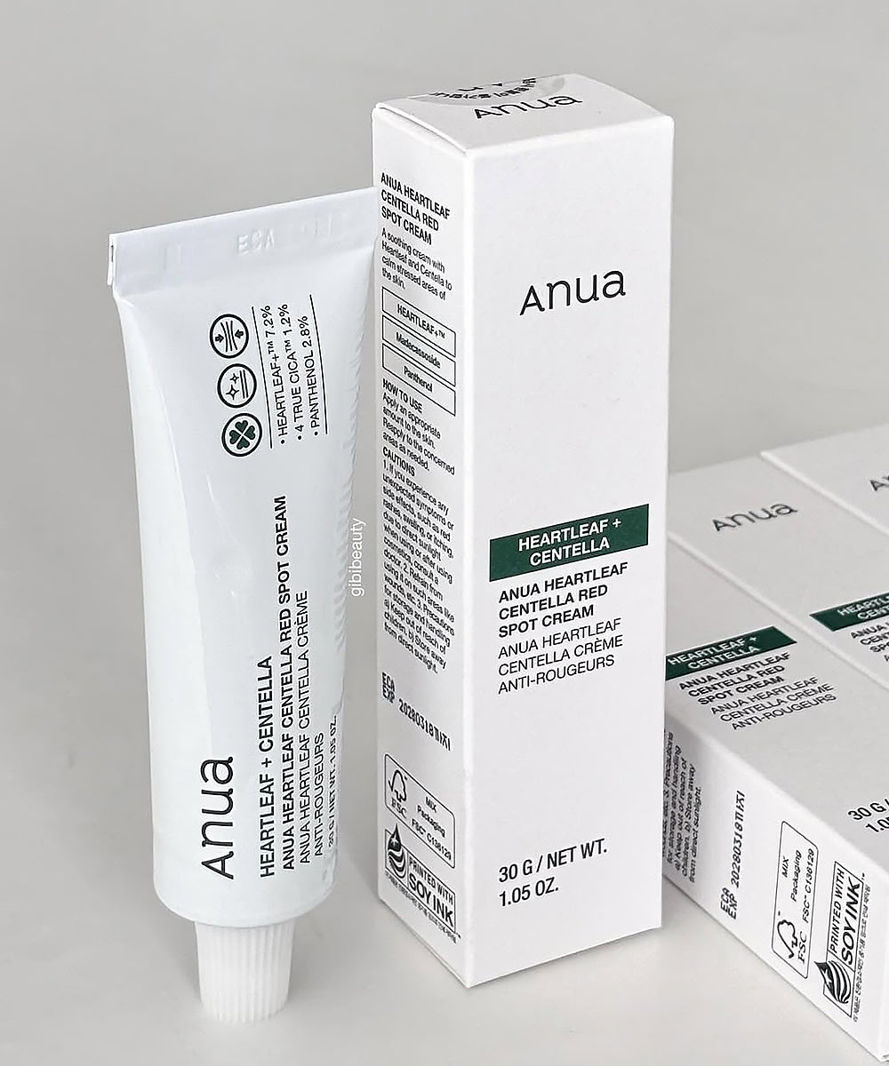 Anua heartleaf and centella cream packaging on a gray background
