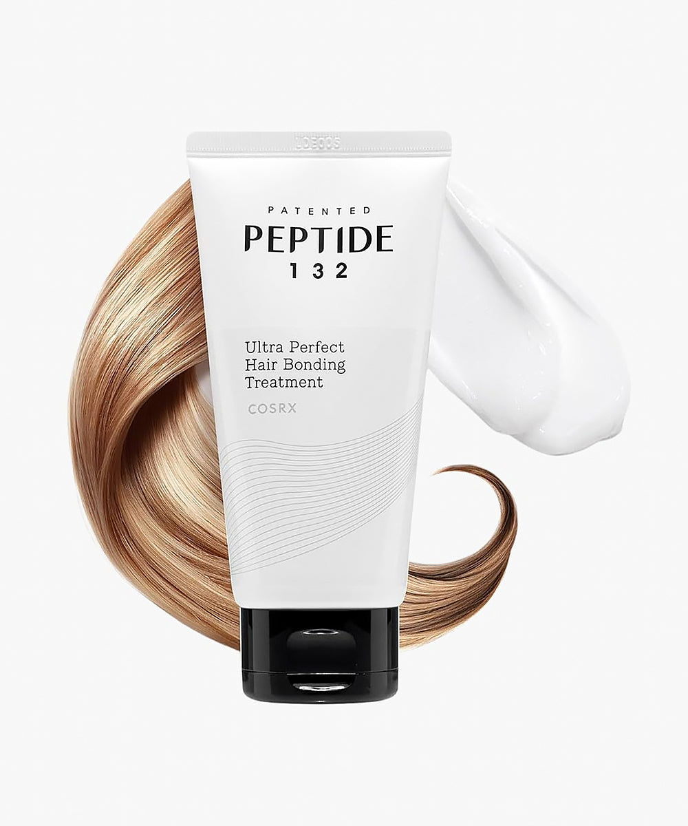 Cosrx Peptide 132 hair treatment tube with blonde hair on a white background