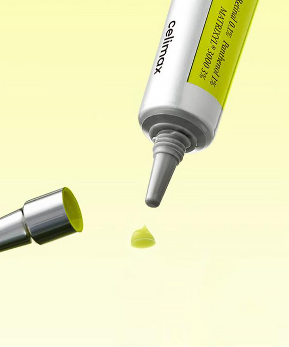 Close-up of a tube labeled 'cellimax' with a yellow substance being dispensed on a light yellow background.
