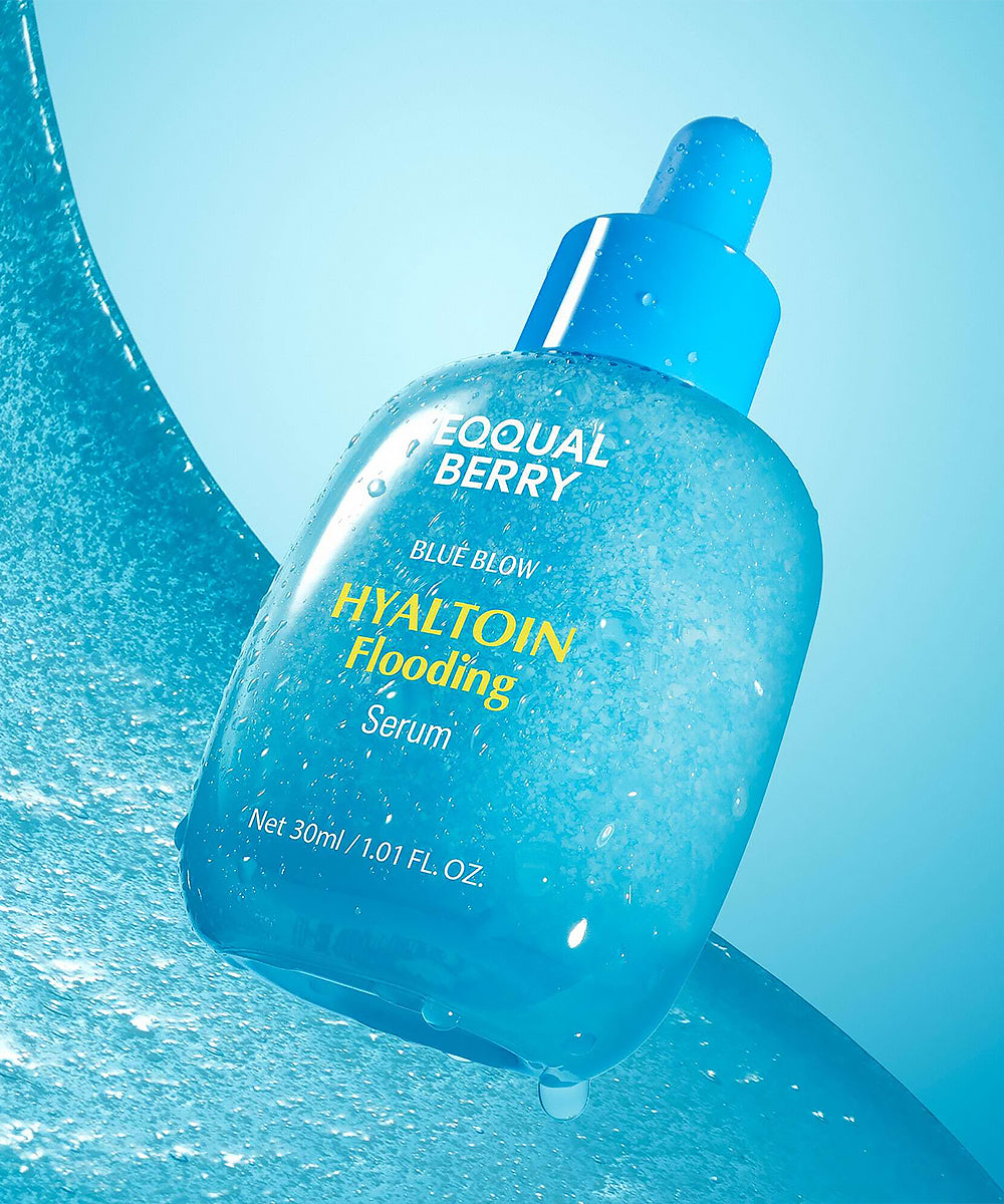Blue skincare serum bottle with 'Equal Berry' branding on a blue background