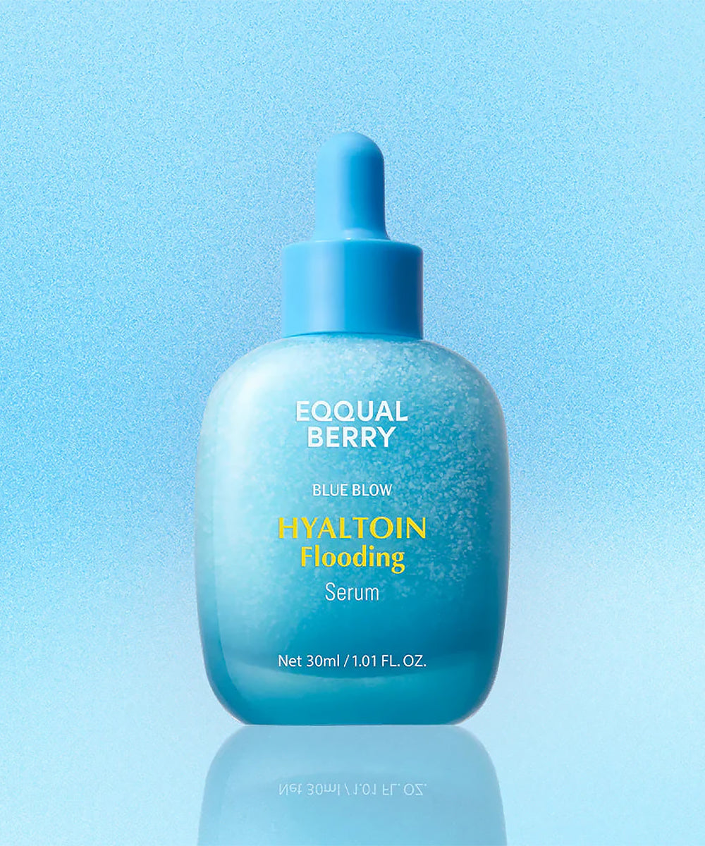 Blue bottle of Equal Berry serum on a light blue background