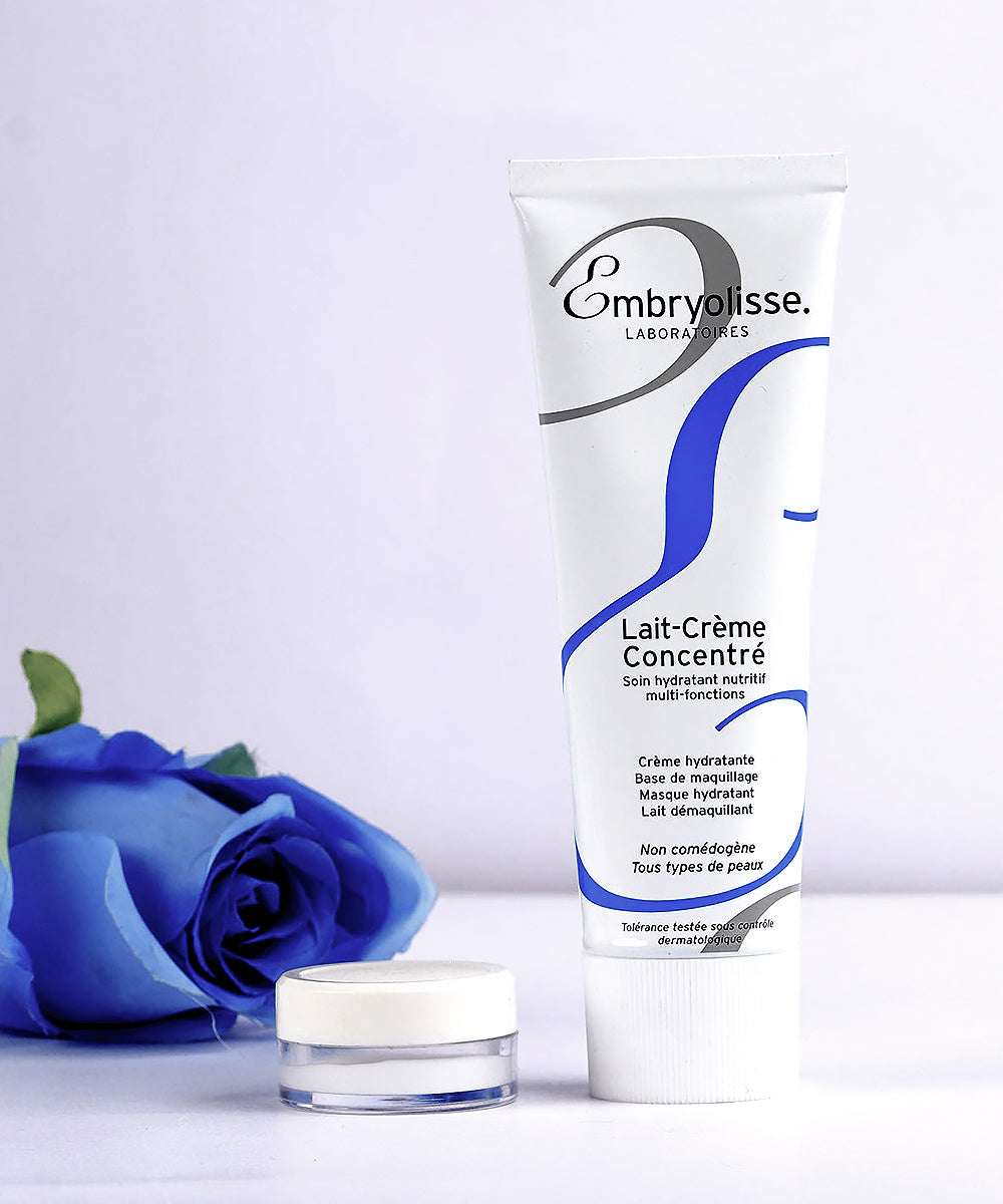 Embryolisse skincare product with a blue rose on a light background