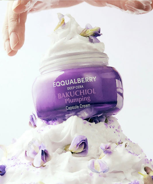 Purple skincare cream jar with white foam and purple flowers on a light background