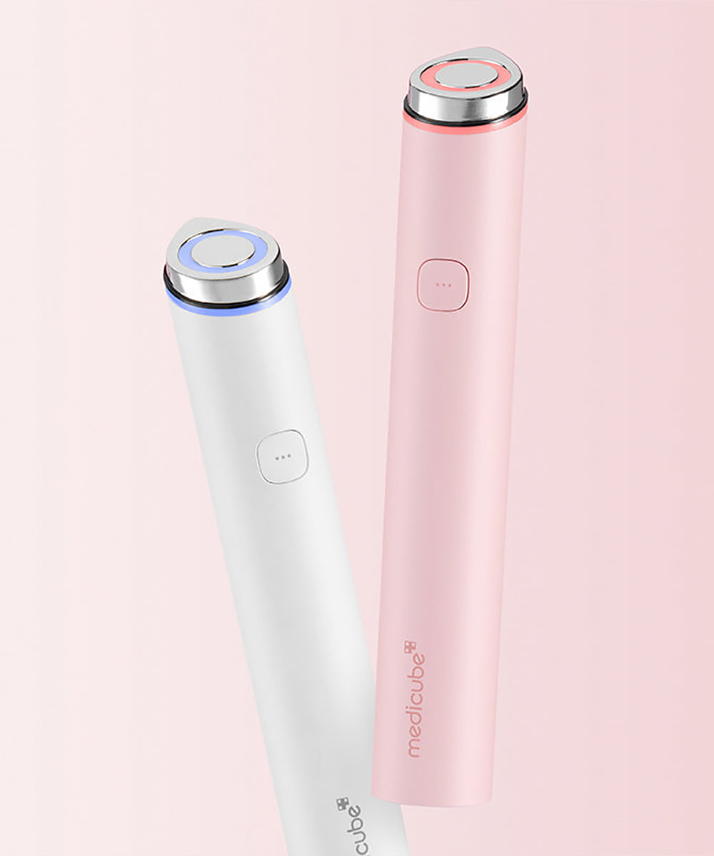 White and pink electronic devices with 'medicube' branding on a light pink background