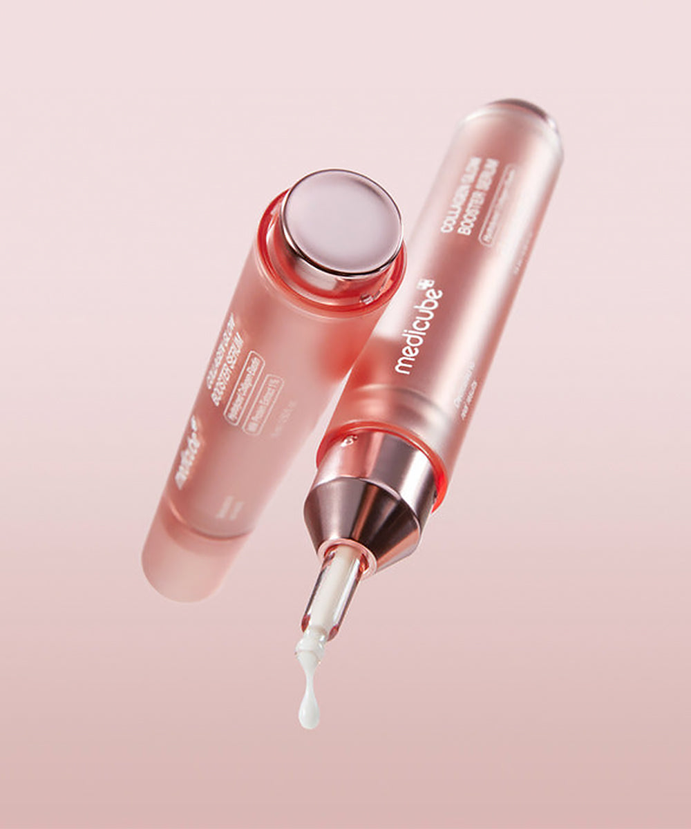 Medicube skincare dropper with pink bottle on a light pink background