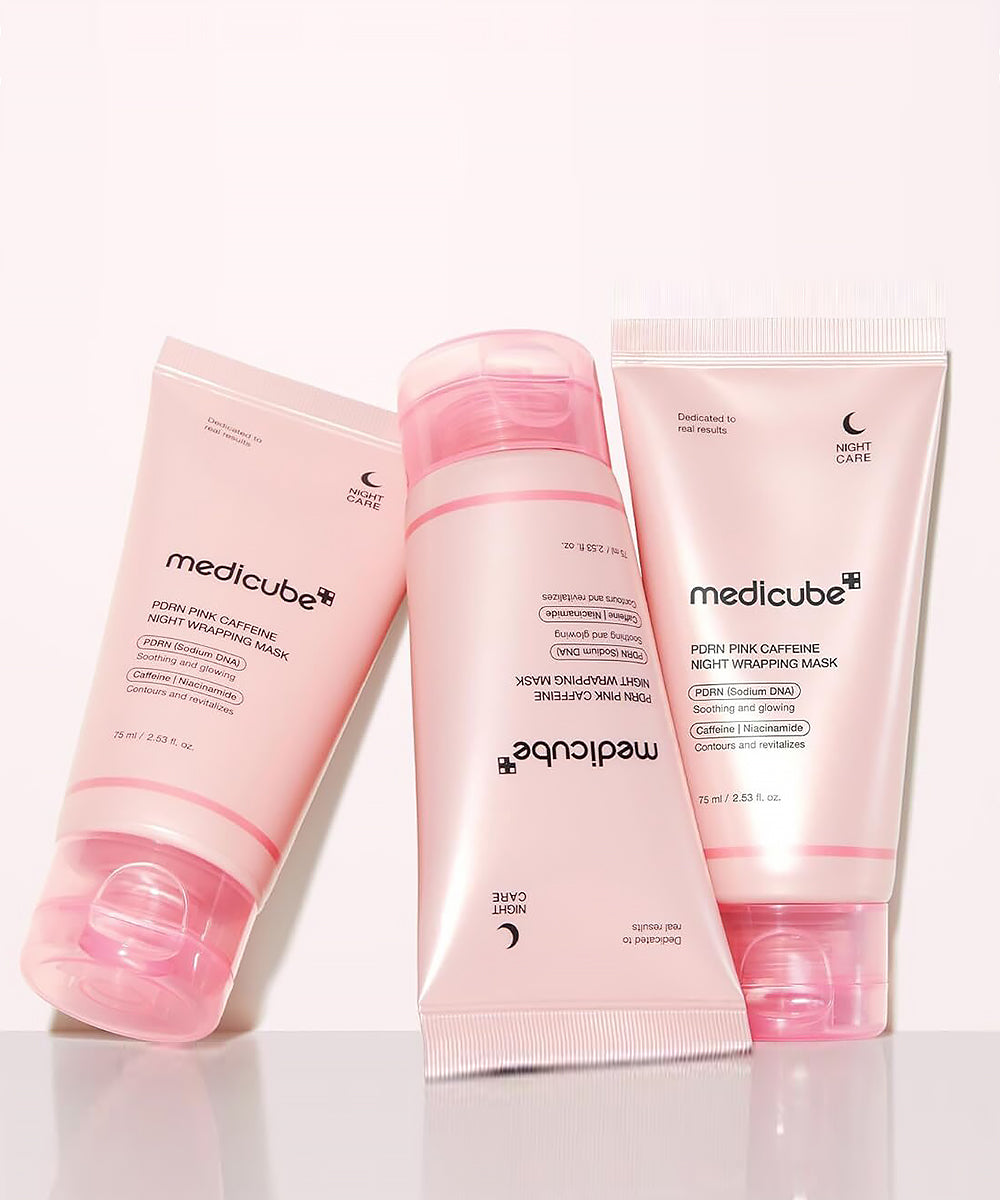 Three pink skincare products from Medicube on a white background