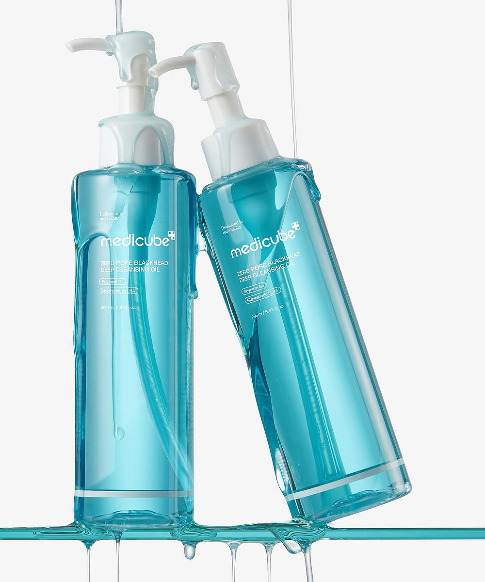 Two blue bottles with pump dispensers labeled 'medicube' on a white background.