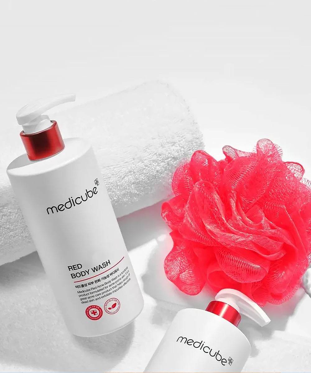 Medicube Red Body Wash bottle with a red loofah on a white background