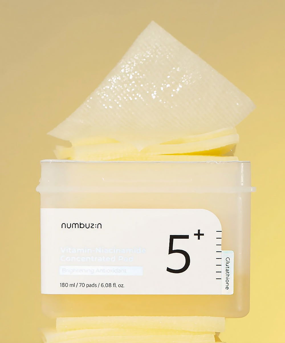 Numbuzin pads with a container and pads on a yellow background