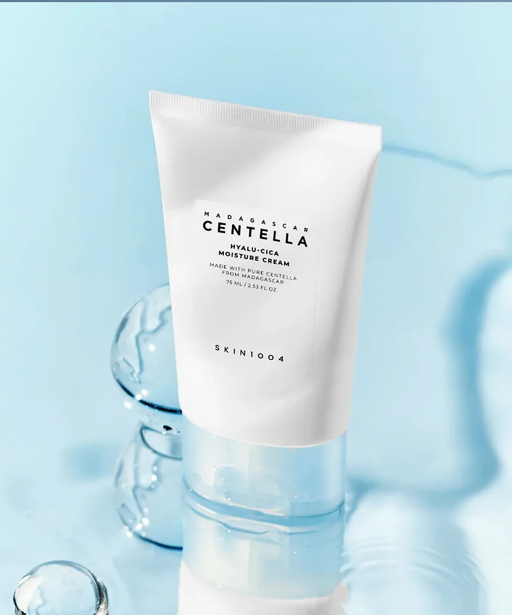Skincare cream tube with 'Madagascan Centella' branding on a light blue background
