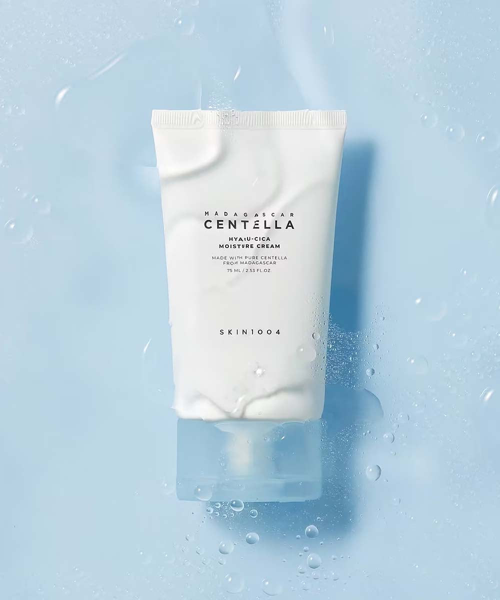 Skincare tube labeled 'Madagascar Centella' on a light blue background