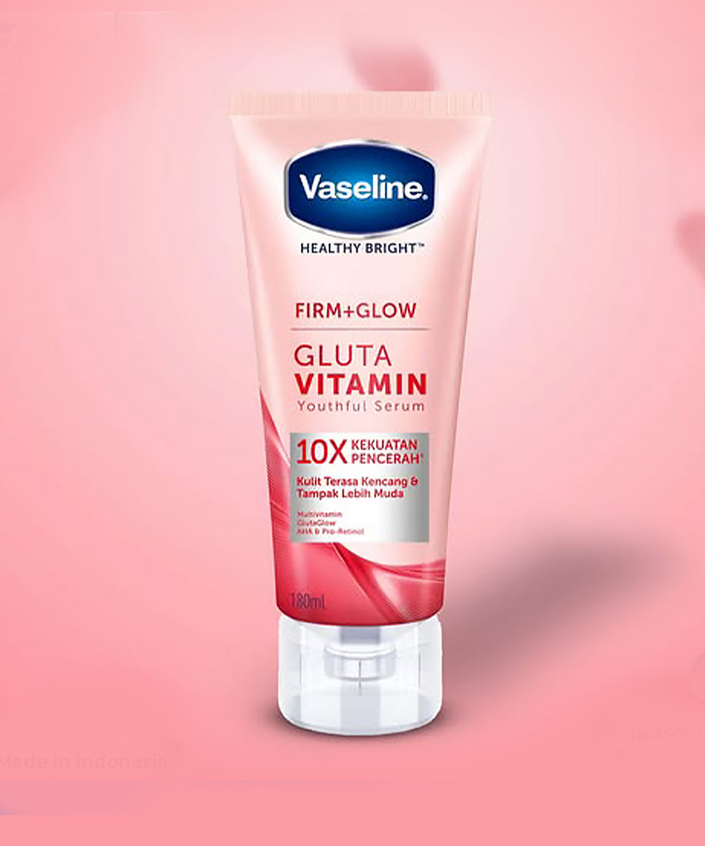 Vaseline Gluta Vitamin serum tube on a pink background