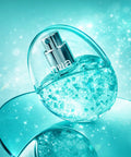 Blue perfume bottle with 'Anua' branding on a matching turquoise background