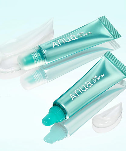 The Anua PDRN Lip Serum tube resting on a reflective surface with water ripples, emphasizing a clean, moisture-focused aesthetic