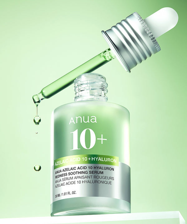 Anua Azelaic Acid 10+ Hyaluron serum bottle with dropper on a green background