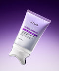 Anua visibly firming cream tube on a purple background