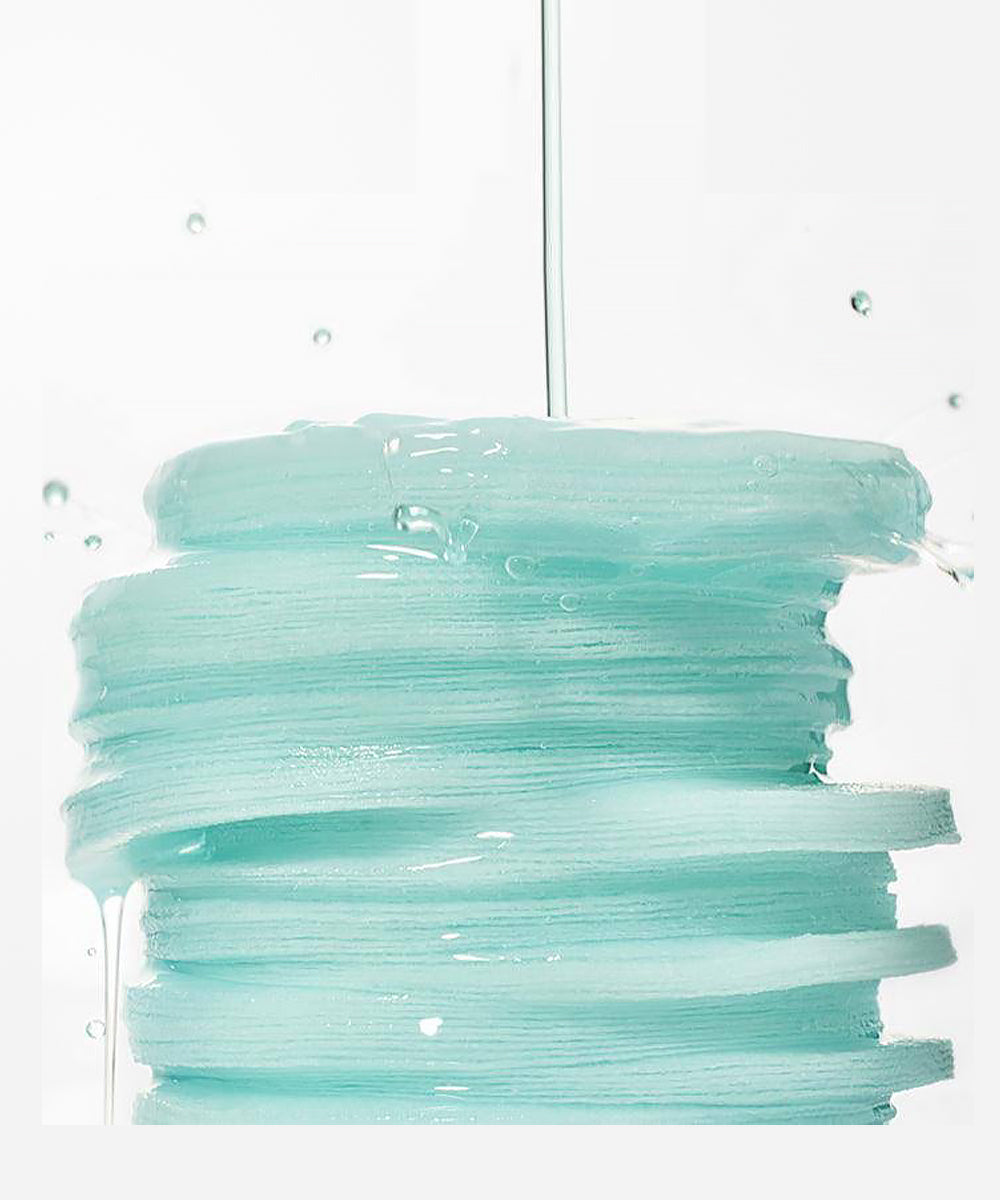 Stack of light blue plastic sheets with water droplets on a white background