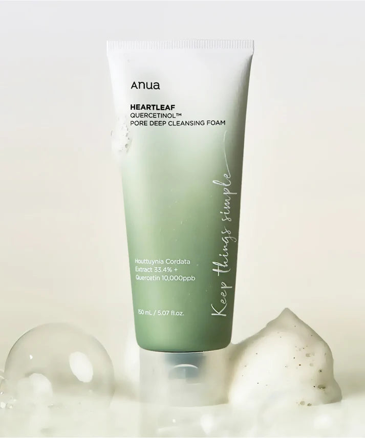 Tube of Anua Heartleaf cleansing foam with bubbles on a light background