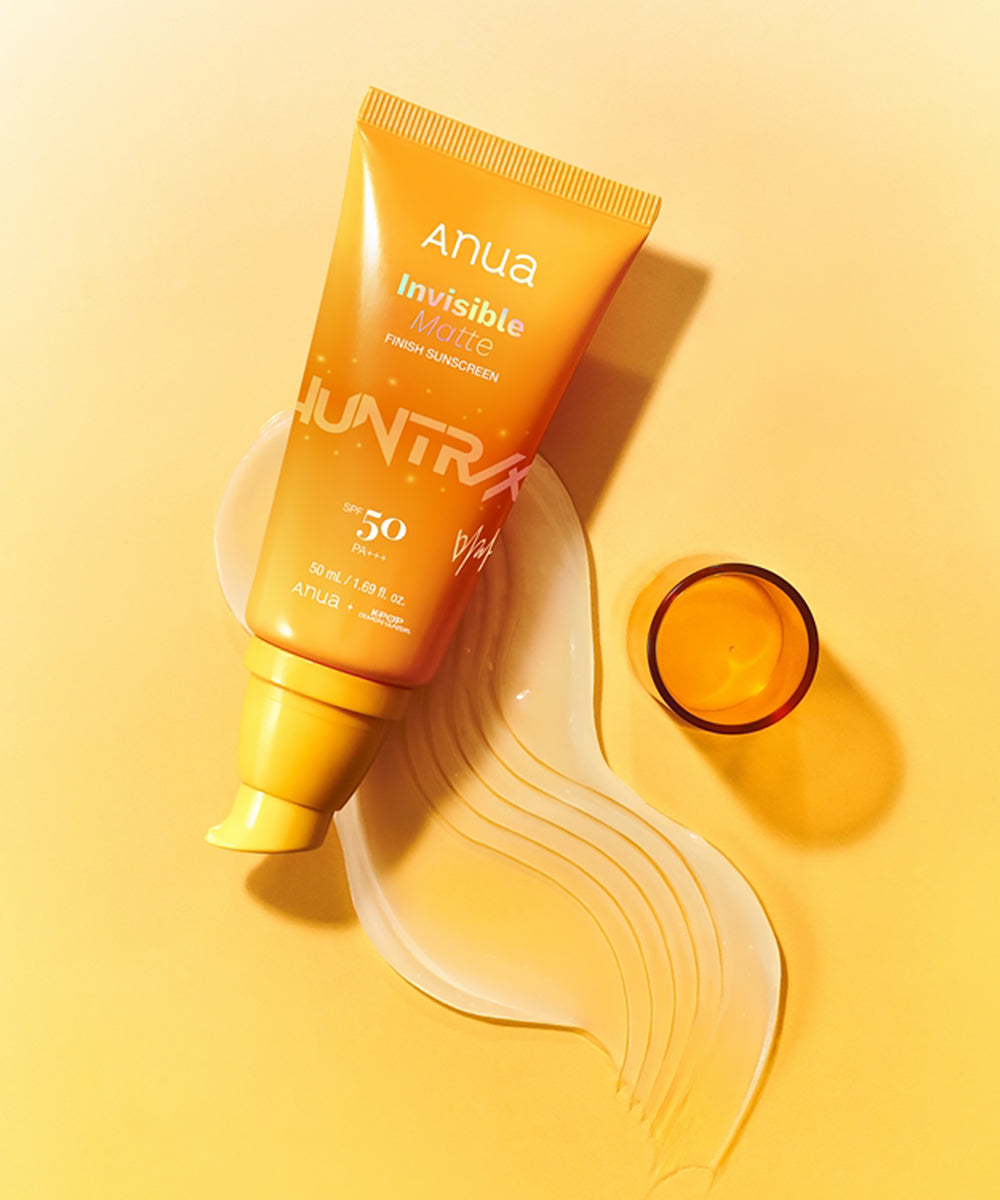 Anua Invisible Matte sunscreen tube on a yellow background