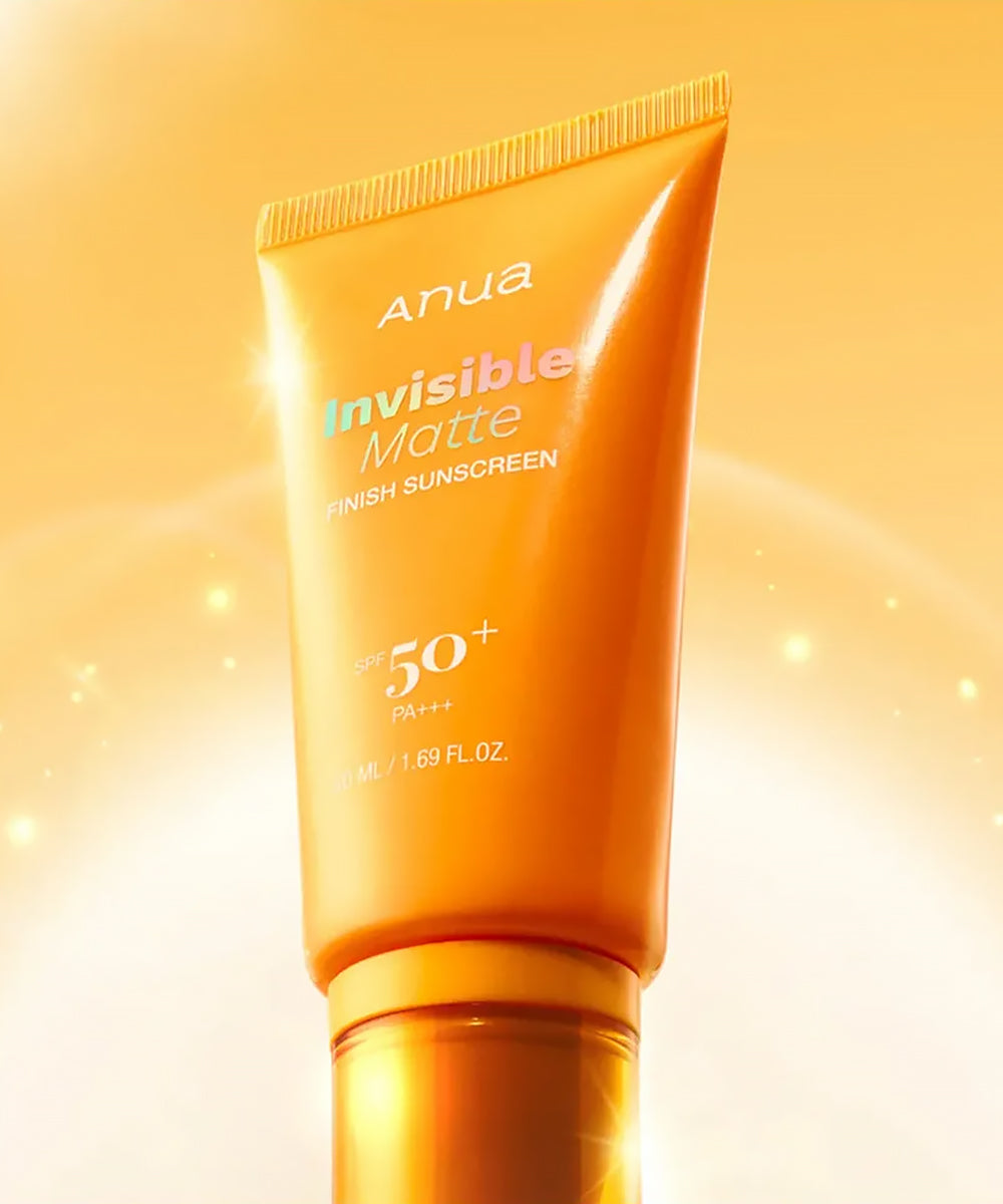 Anua Invisible Matte Finish Sunscreen bottle on a yellow background