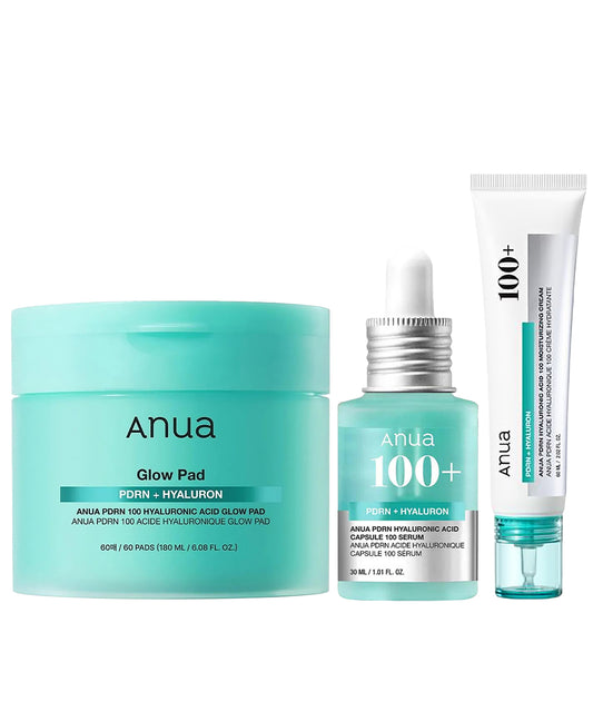 Anua skincare product set including a jar, serum, and cream on a white background
