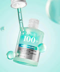 Anua 100+ serum bottle with dropper on a light blue background
