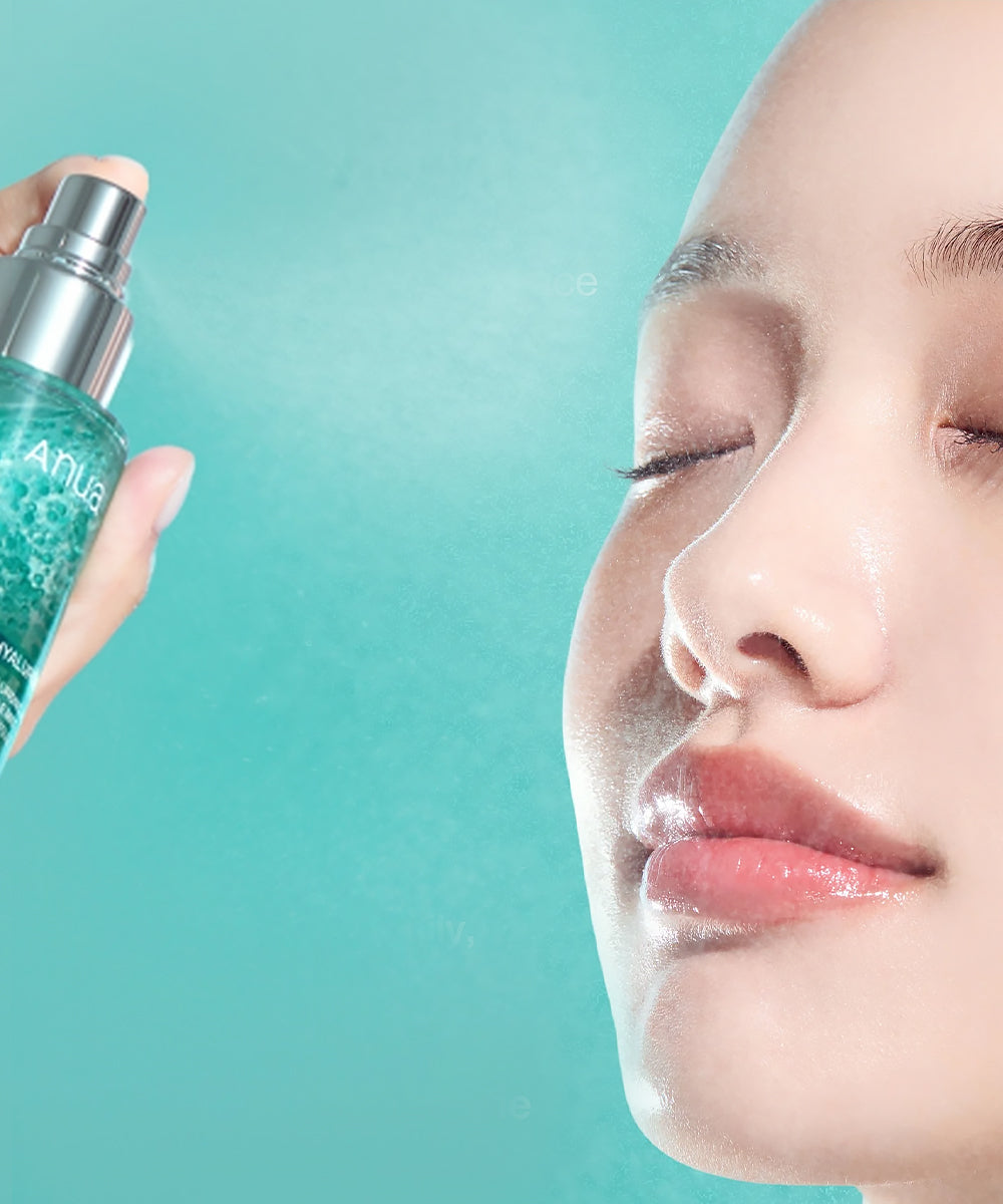 A person with eyes closed using the Anua Capsule Mist, demonstrating the fine spray application for a refreshed and glowing complexion