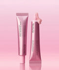 Two tubes of Arencia PDRN Booster Shot on a pink gradient background, with one tube open to show the thick, hydrating consistency of the peptide-infused cream