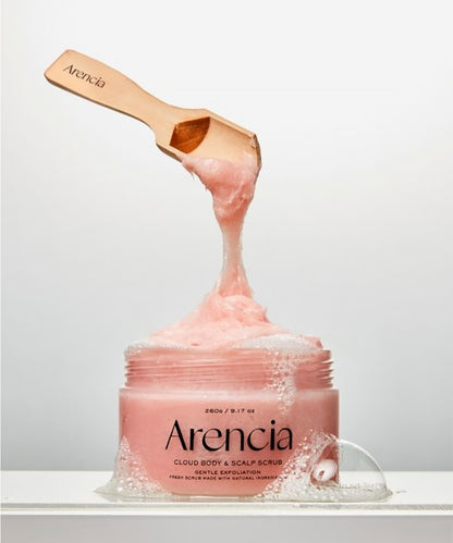 Arencia cloud body & scalp scrub with a scoop of product on a white background