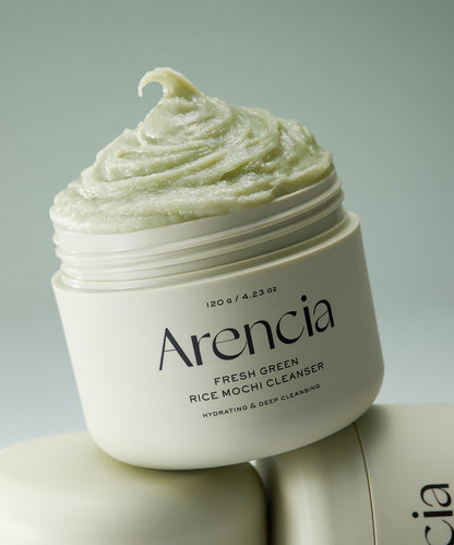 Arencia Fresh Green Rice Mochi Cleanser jar with green cream on a light gray background