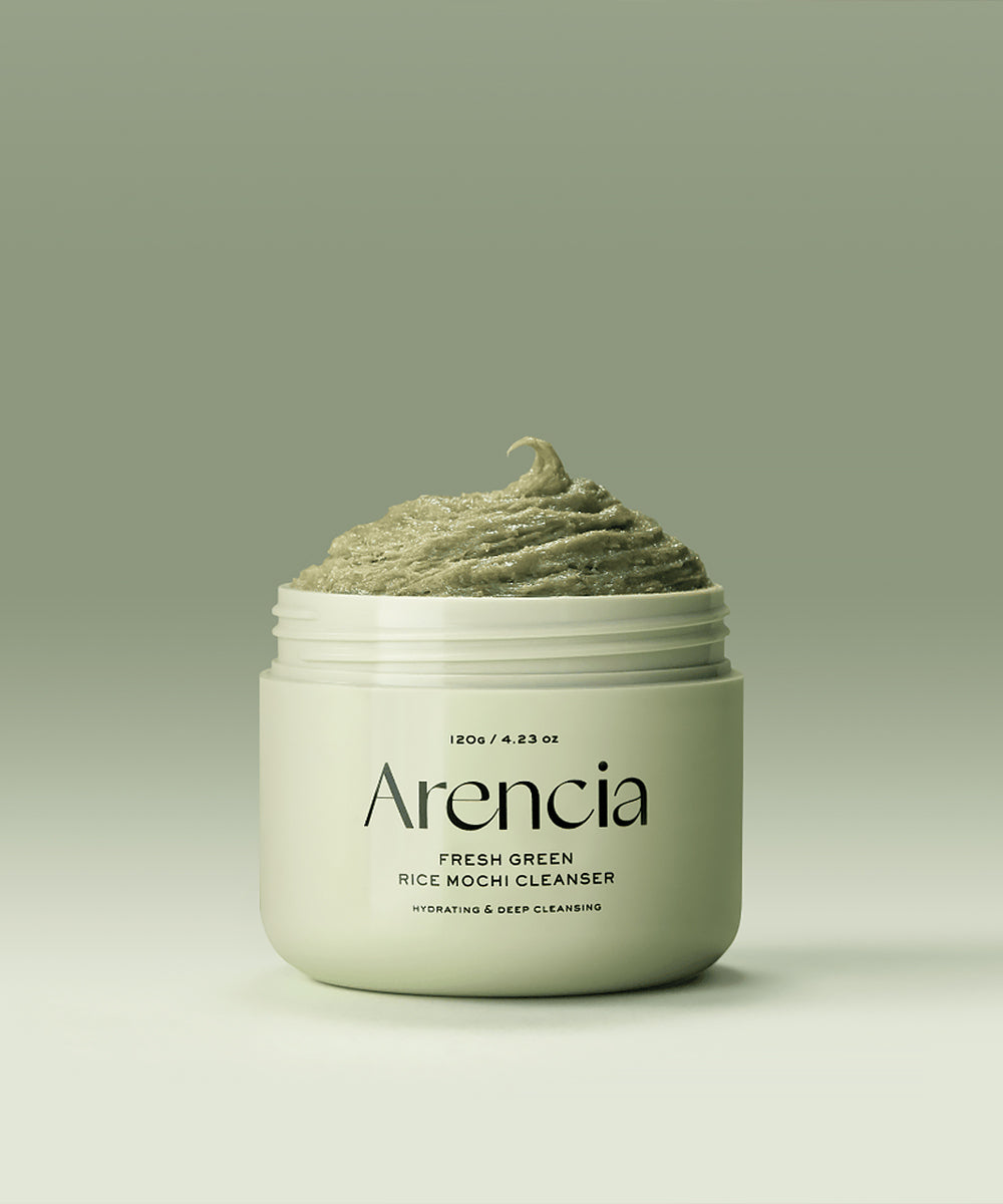 Jar of Arencia Fresh Green Rice Mochi Cleanser on a light green background
