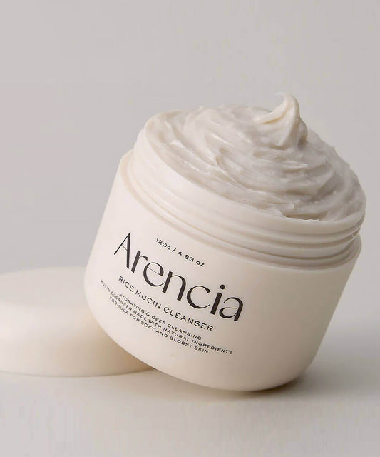 Arencia rice mucin cleanser jar with cream on a light background