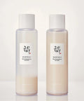 Two bottles of 'Beauty of Joseon' rice milk on a white background