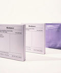 A perspective view of three white mask boxes lined up in a row against a clean, white background.
