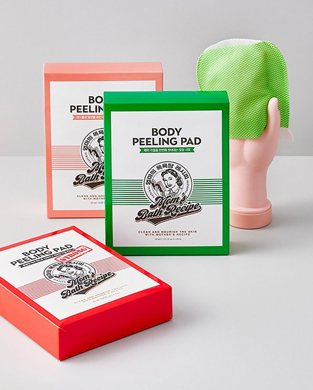 Body peeling pad packaging with a green pad on a gray background