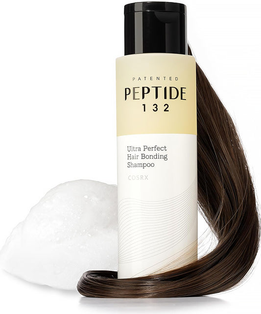 Shampoo bottle labeled 'Peptide 132' with a strand of hair on a white background