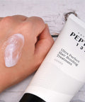 COSRX Ultra Perfect Hair Bonding Treatment being applied to a hand