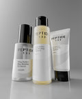 CosRX Peptide 132 hair care products on a gray background