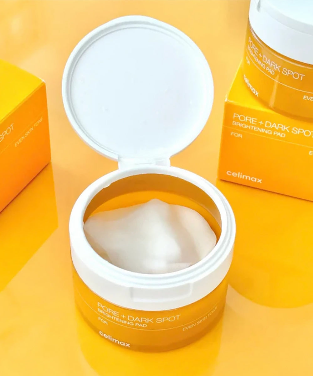Open jar of celimax skincare product on a yellow background
