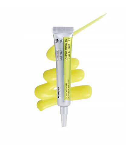 Cosmetic tube with applicator on a white background