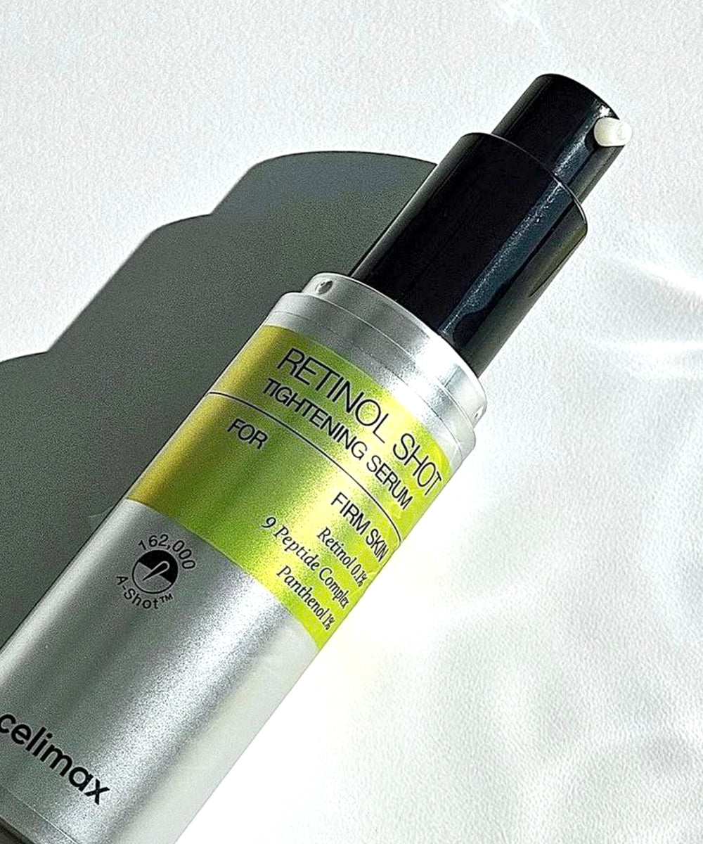 Retinol shot tightening serum bottle with green label on a white background