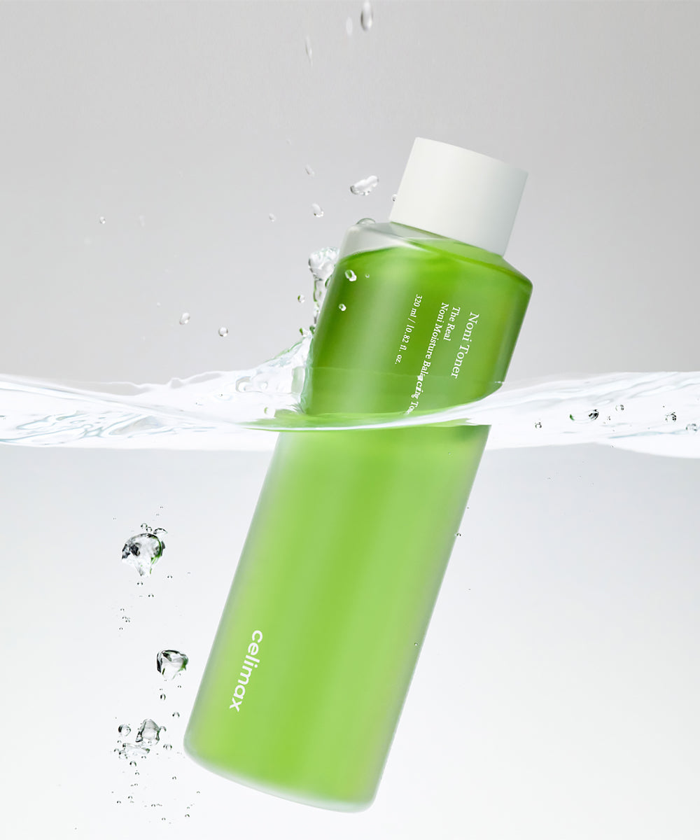 Green bottle with white cap on a gray background