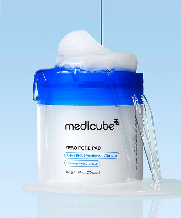 Medicube Zero Pore Pad packaging with blue cap and white foam on a light blue background