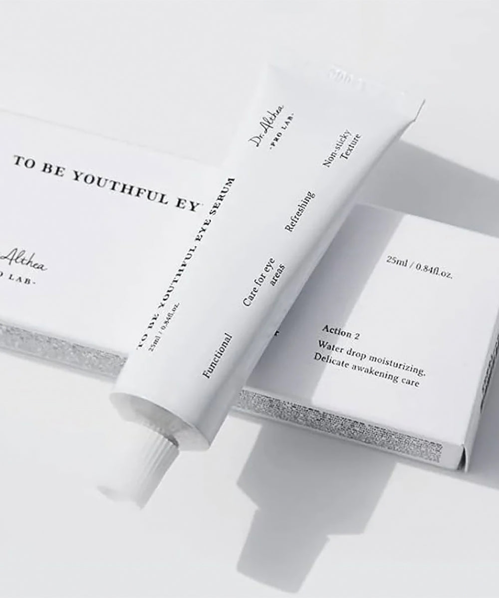 Skincare product packaging with text on a white background