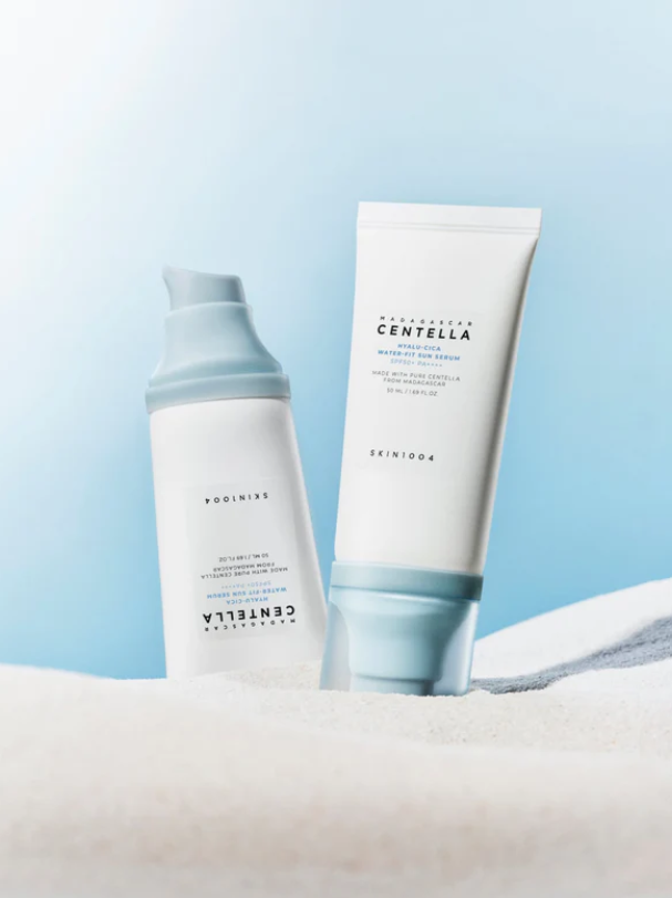 Two skincare products with 'Centella' branding on a light blue background.