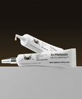 Dr. Melaxin neck cream tube with applicator and texture detail on minimal background